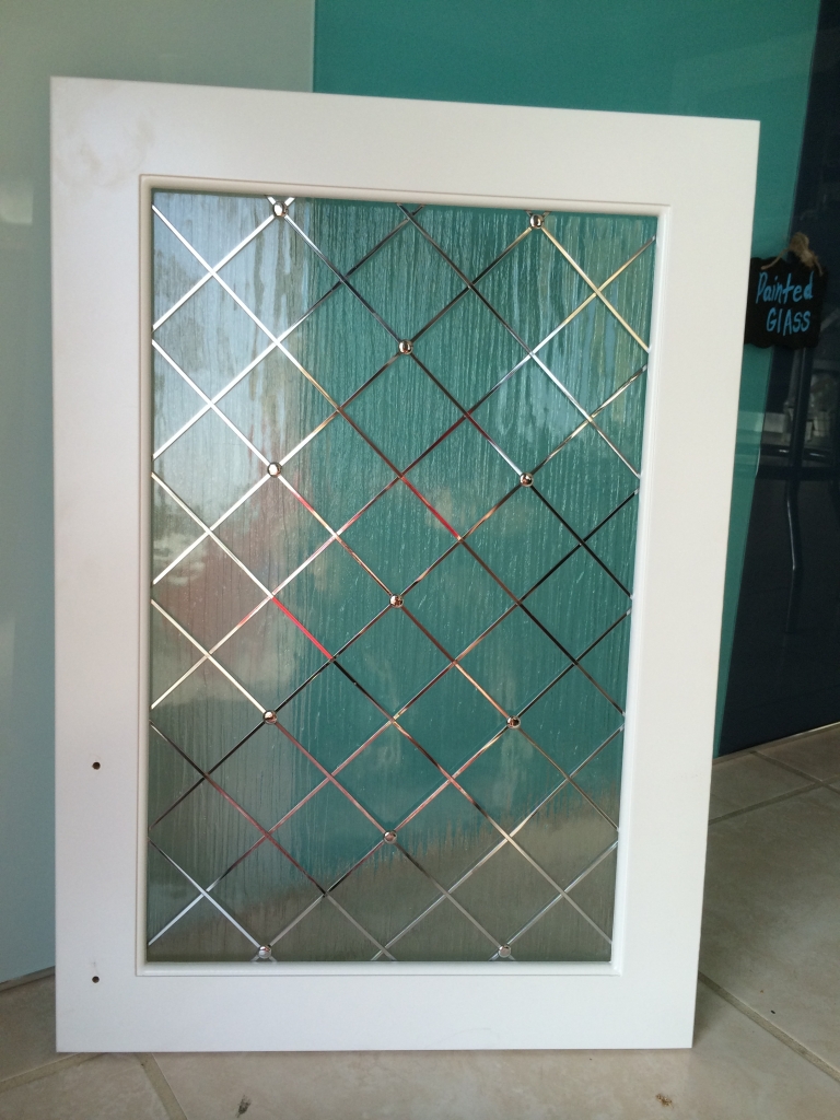 cabinet  glass and metal wire grid grille door