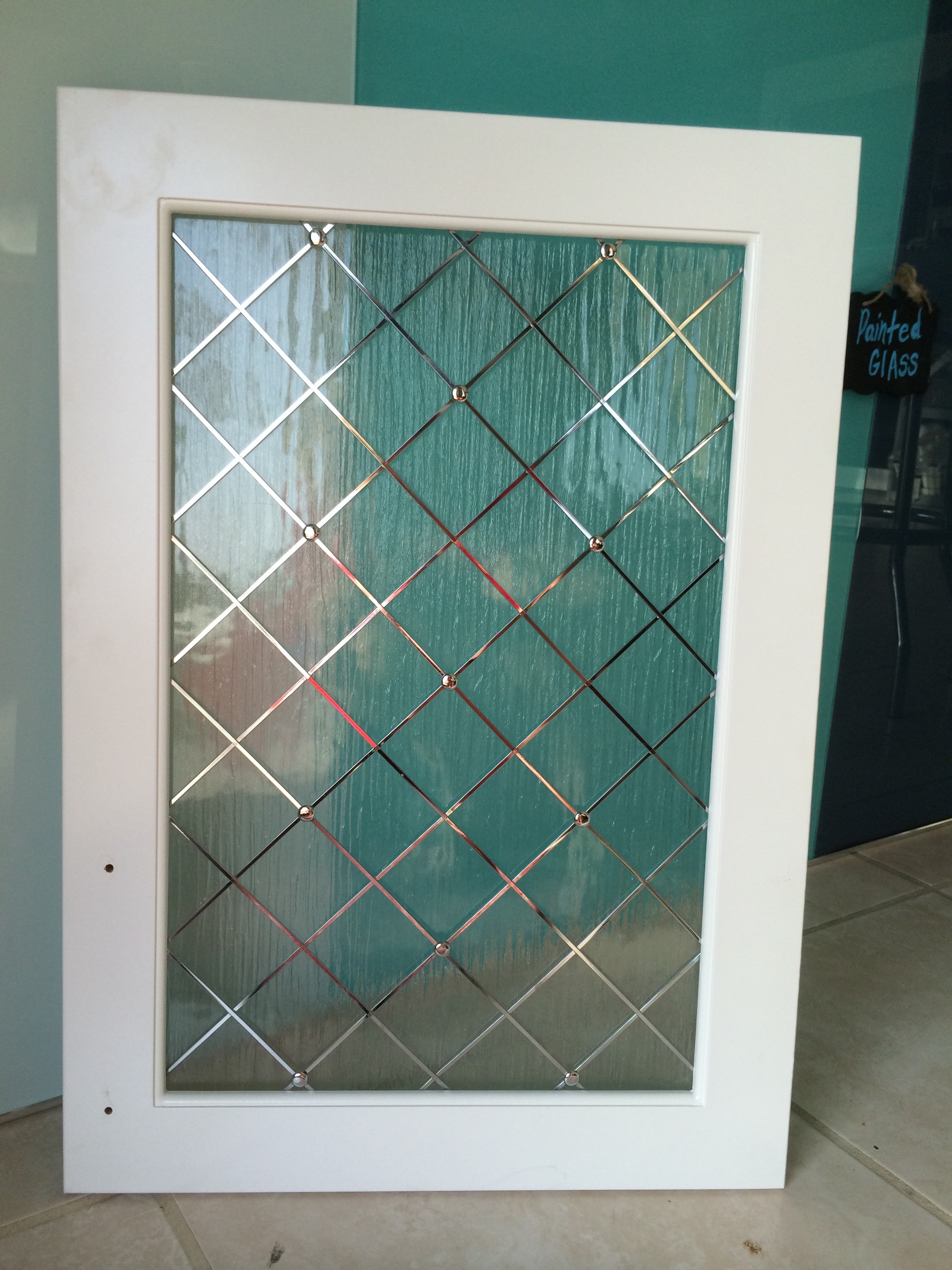 insert glass into cabinet doors