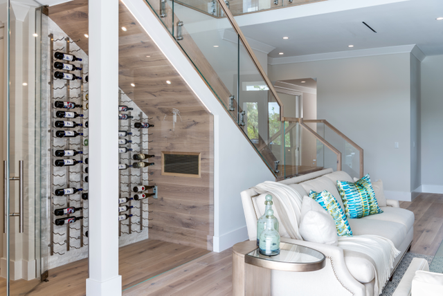 frameless Glass Wine room storage under the stairs naples